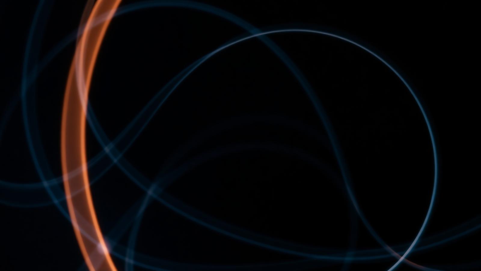 Abstract long-exposure light trails representing digital transformation and change over time